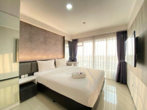 Comfy Studio at Gateway Pasteur Apartment By Travelio